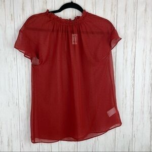 Express NWT rust polka dot blouse